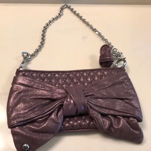 Juicy couture purple shoulder bag with a big bow